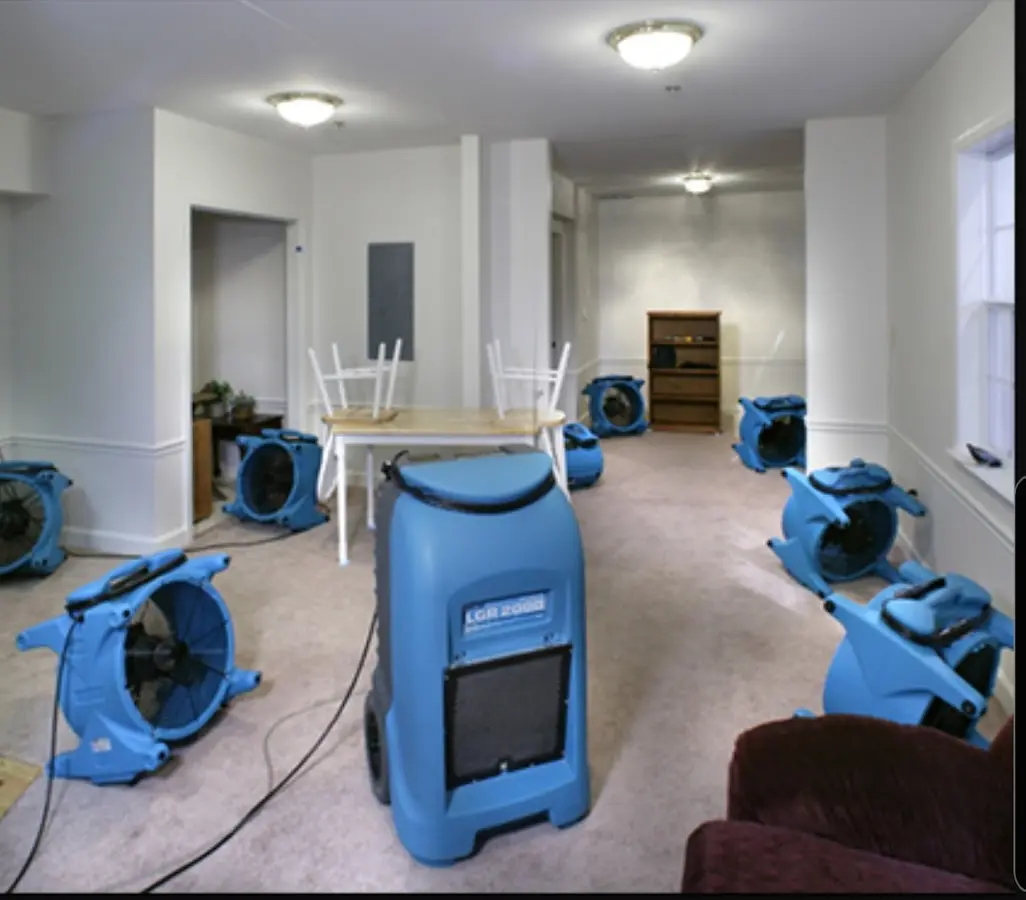 Air movers and dehumidifier setup for Water Damage Restoration in Brandon